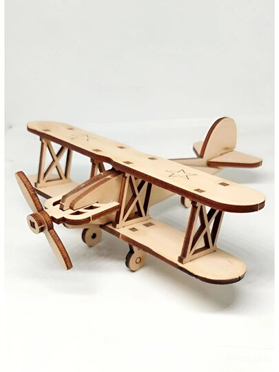 Конструктор кукурузник . Шлифованный фанера 3 мм . клей ПВА. легко выдавливаются. После сборки можно раскрасить.