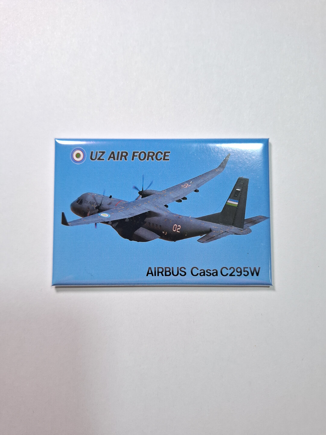 Фото магнит (авиасувенир), фото самолёта Airbus Casa C-295W Uz Air Froce, размер 8x5 см