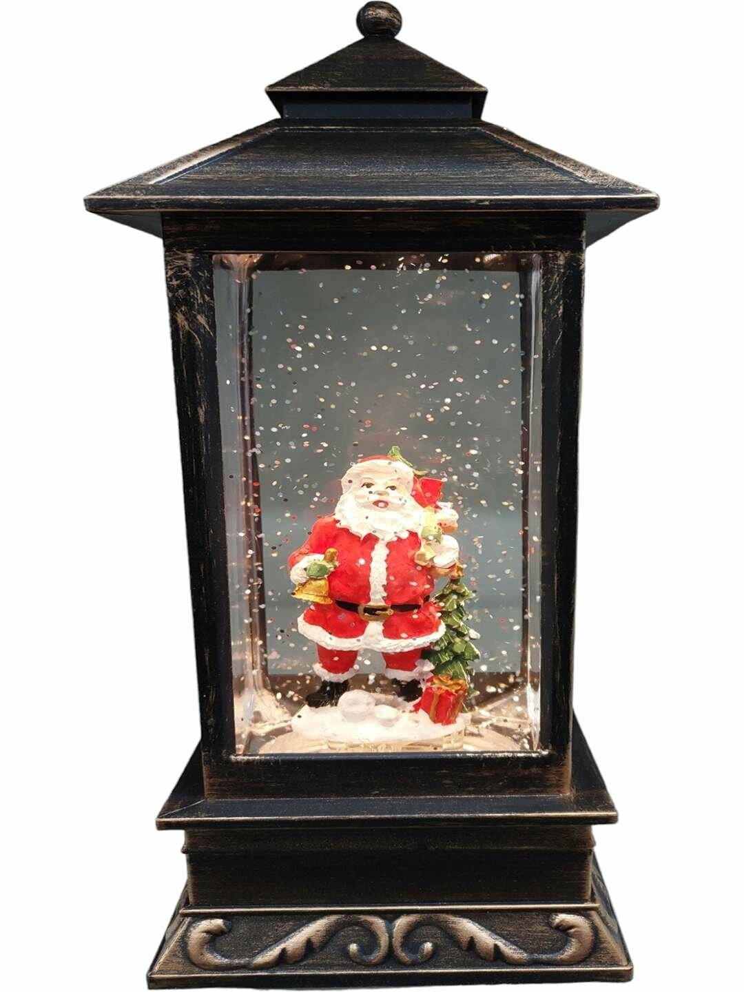 Новогодний фонарь со снегом и фигуркой Деда Мороза — яркое декоративное украшение для дома.