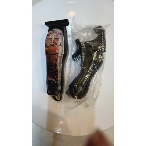 Машинка для стрижки VGR V-953 с рисунком граффити для волос головы бороды и усов 3 насадки 110000₽