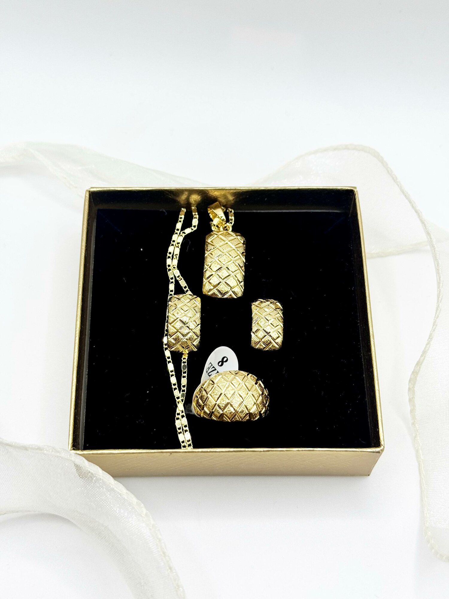 Комплект бижутерии RADI: колье, кольцо, серьги, цепь