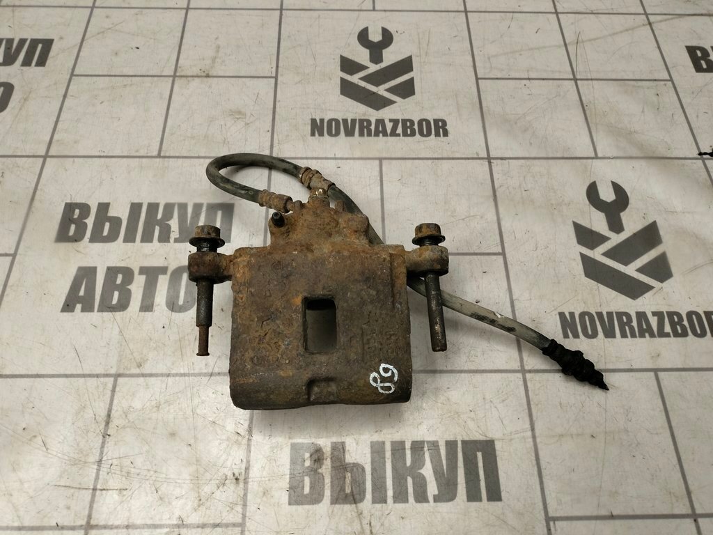Суппорт передний правый Kia RIO 1 2000-2004