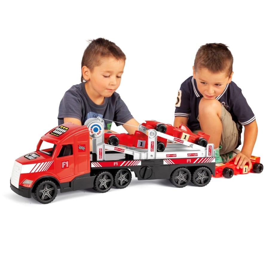 Игрушечная машинка Wader Magic Truck Action, грузовик-эвакуатор с гоночными болидами