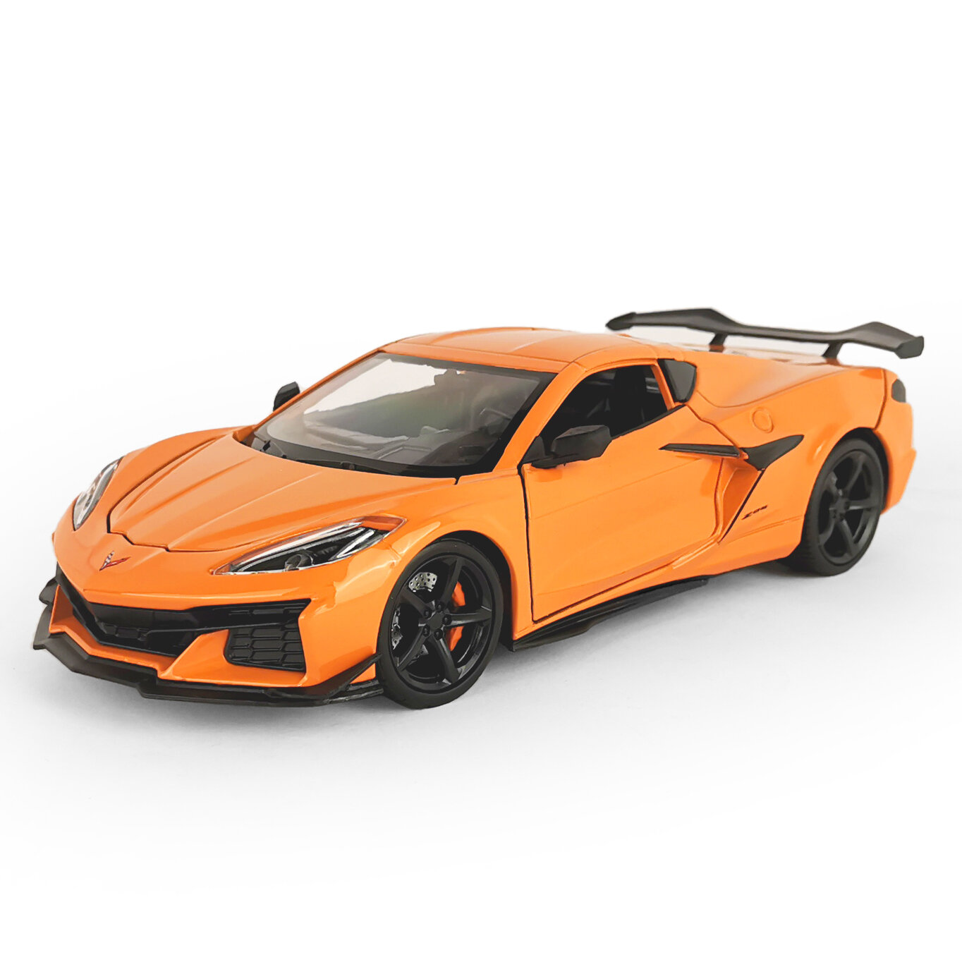 Welly Машинка металлическая 1:24 Chevrolet Corvette Z06, оранжевый