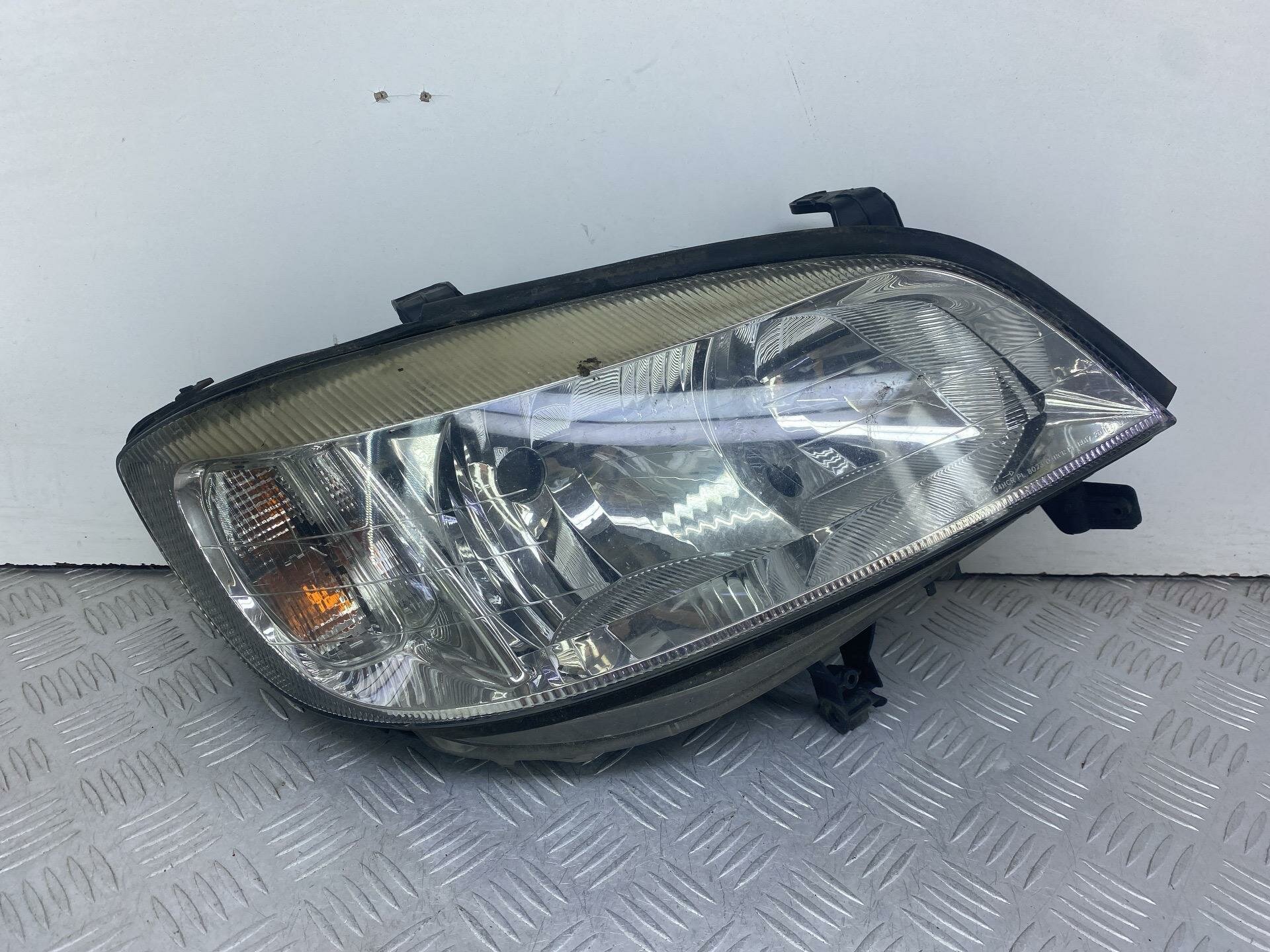 Фара правая Opel Zafira A рест. 2004 89100055