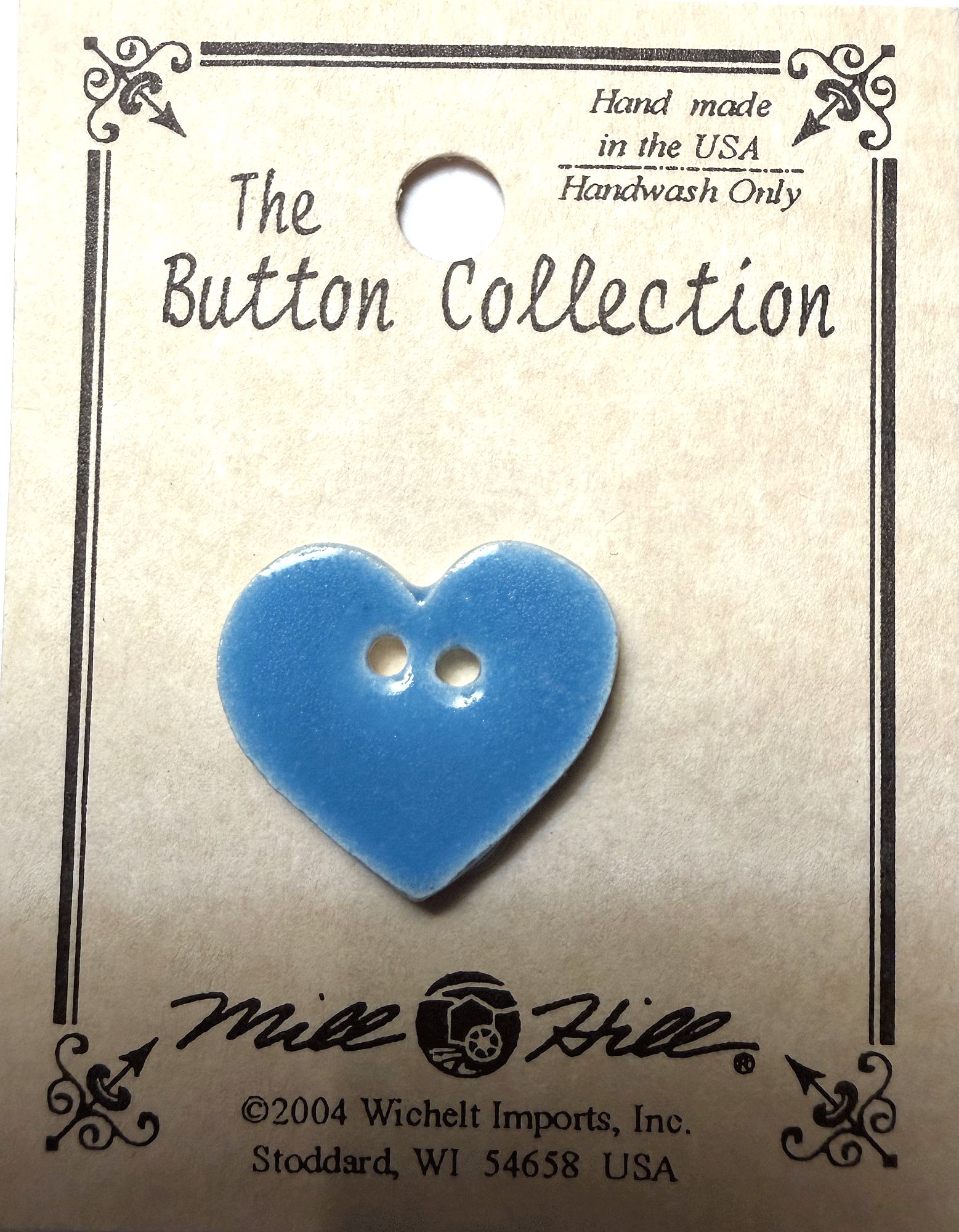 Декоративная пуговица "Small aqua heart" (16x16 мм.) / Mill Hill 86397
