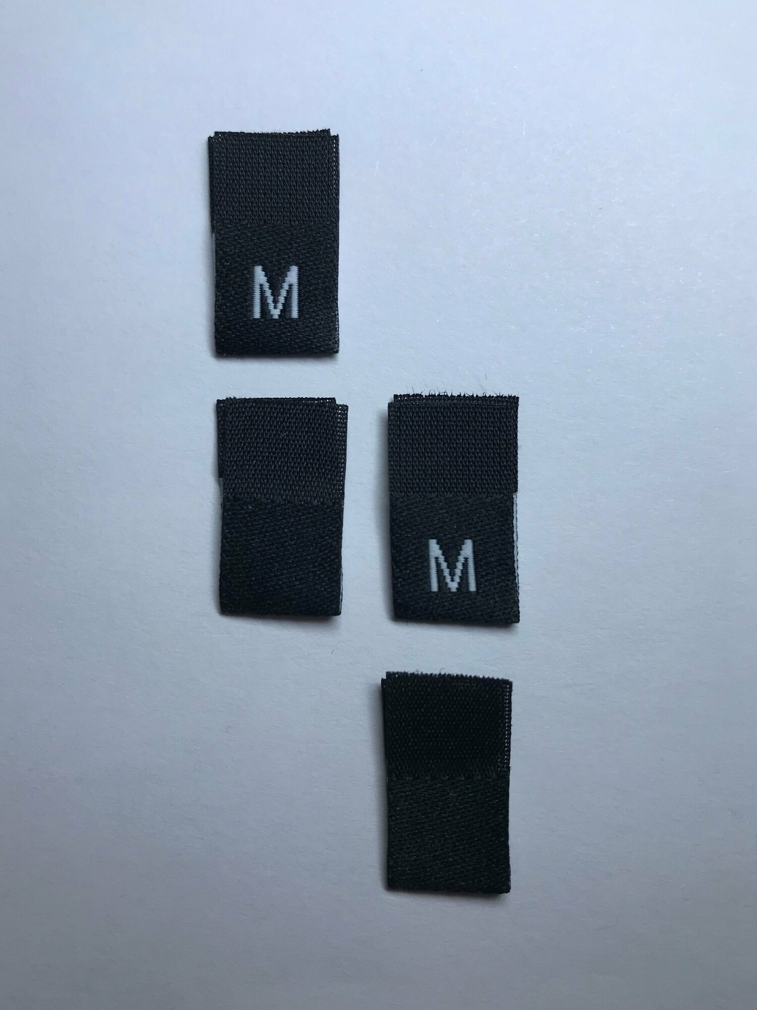 Размерник для одежды жаккардовый пришивной черный/ Набор 7 размеров по 20 шт. (XS, S, M, L, XL, XXL, 3XL), 140 шт