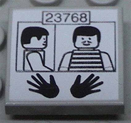 Деталь Lego 3068pb0002 Tile 2 x 2 with Prisoner ID 23768 Pattern