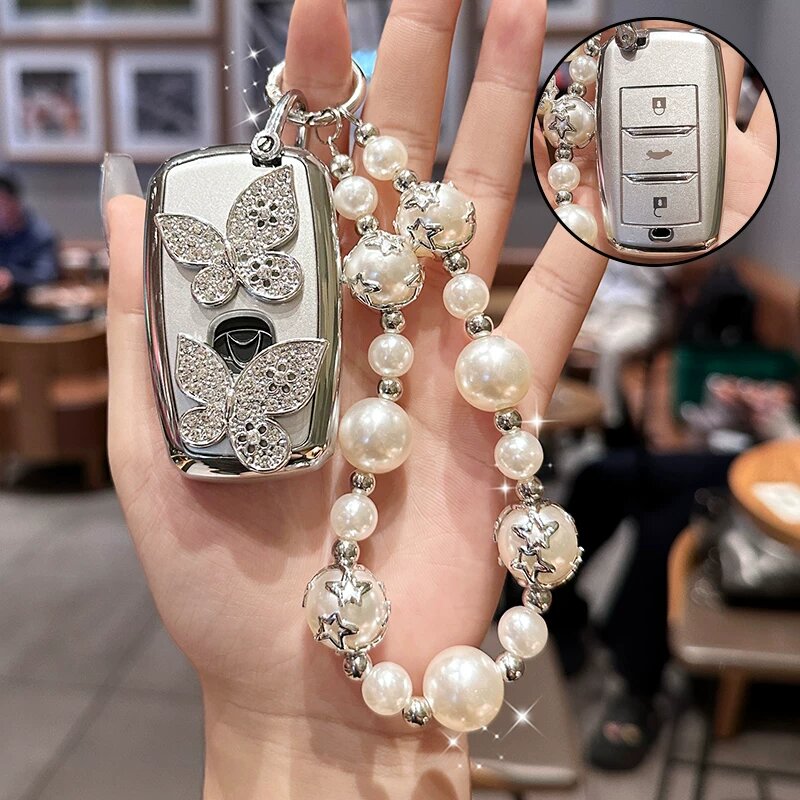Серебристый брелок E Small Smart с жемчужной цепочкой из серебряных звезд и диамантовой бабочкой-зажимом
