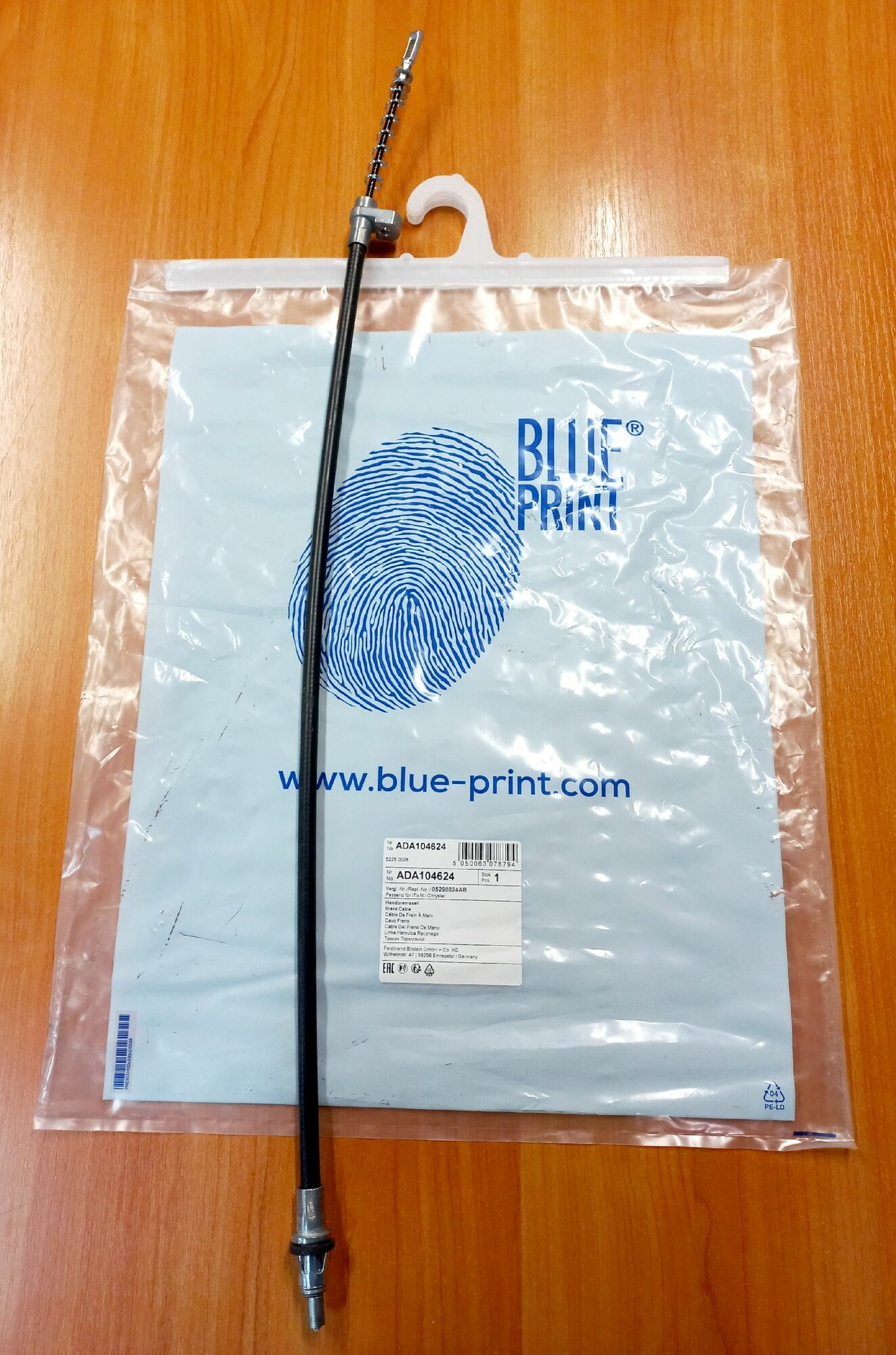 Трос стояночного тормоза ADA104624 Blue Print