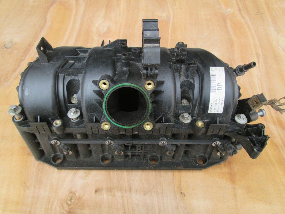 Коллектор впускной 55557904 Opel Corsa D 2006> б/у