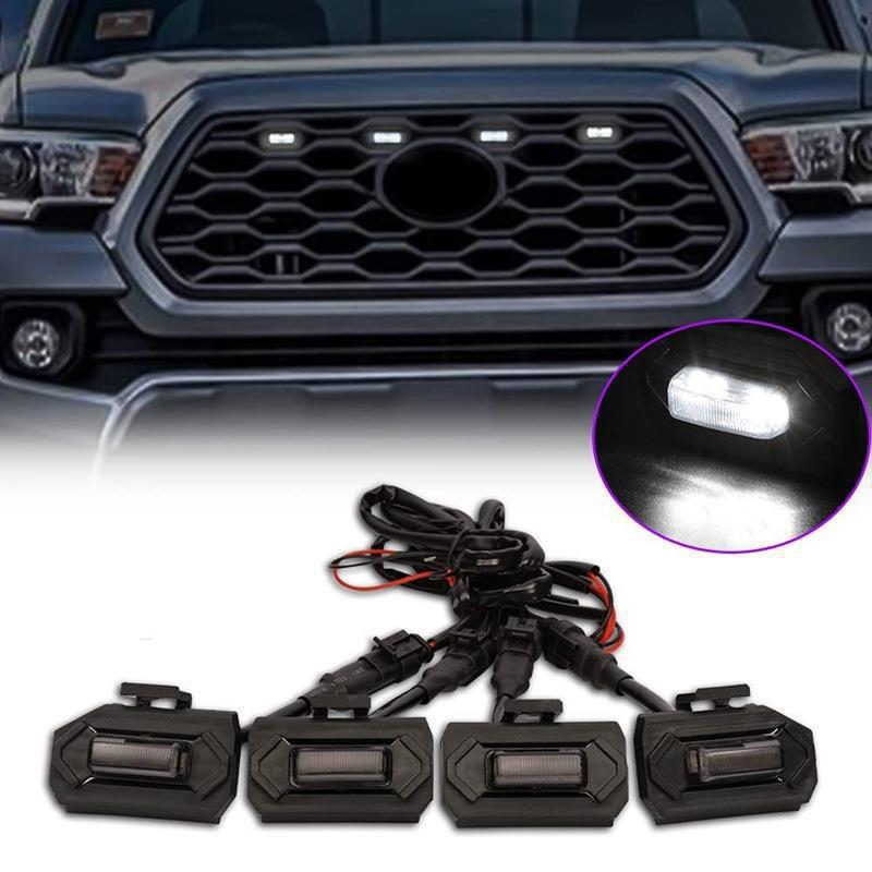 Комплект светодиодных дневных огней для решетки Toyota TACOMA, черный корпус с белой линзой (установка 1х4)