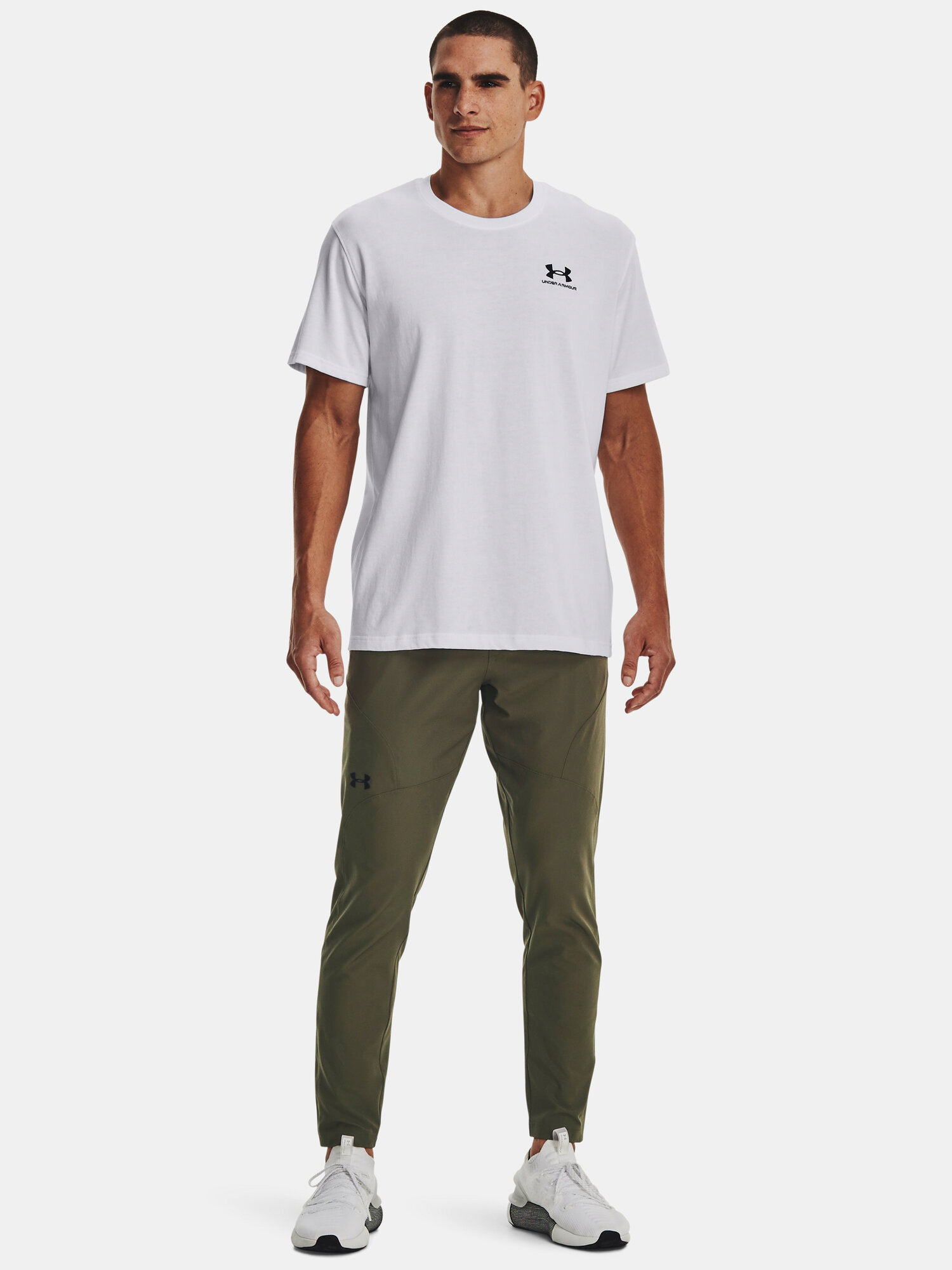 Брюки спортивные Under Armour Unstoppable Tapered, размер XS, темно-зеленый — фото 1