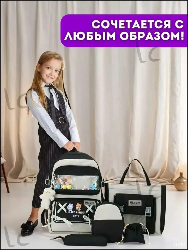 Рюкзак детский черно-белый средний 20-30 л с 6 внешними карманами и 2 отделениями — фото 1