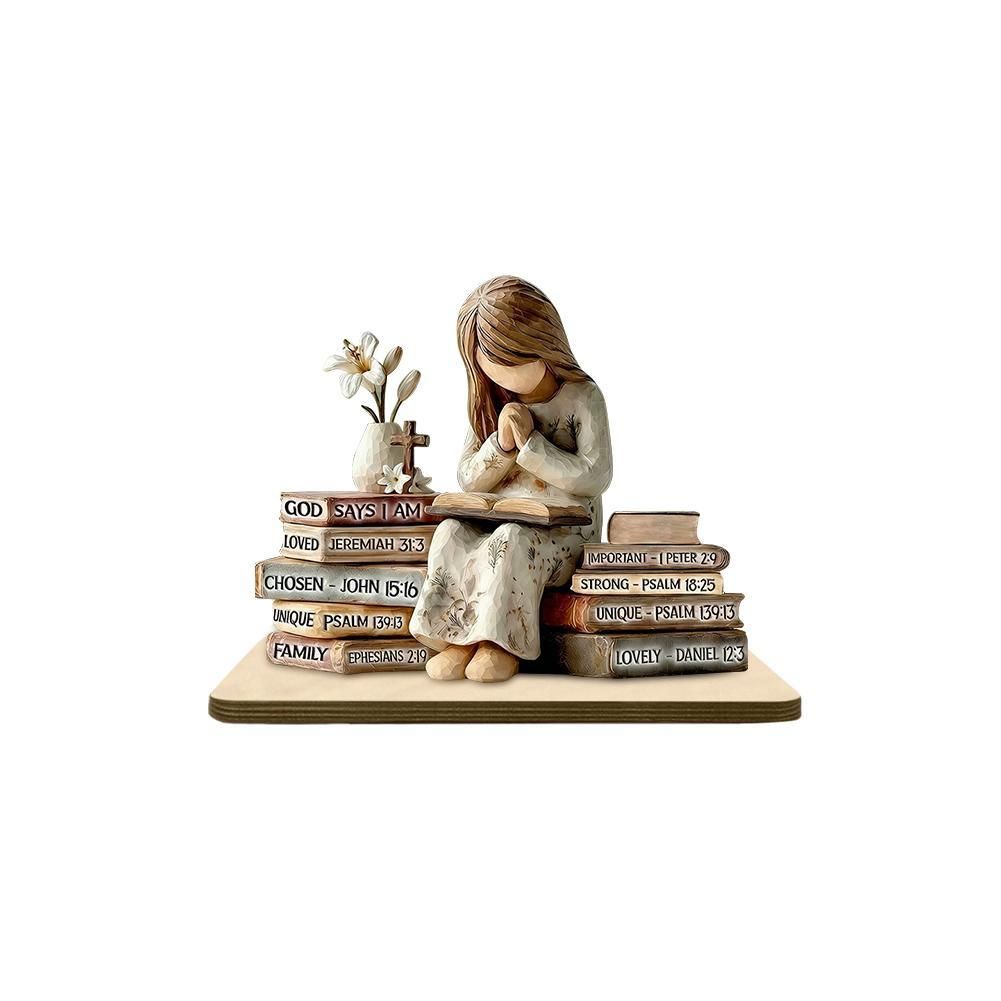 Статуэтка молящаяся девушка на книгах, с крестом