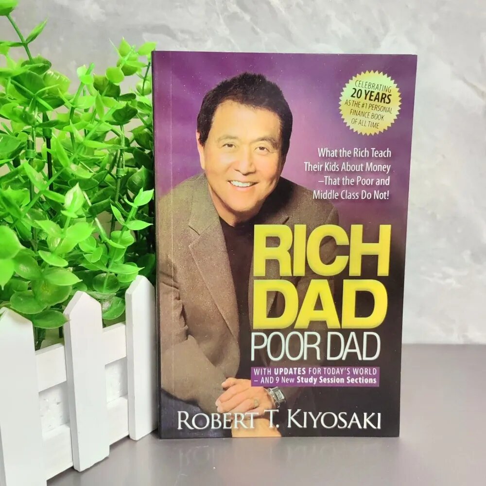 Книга Rich Dad Poor Dad / Богатый папа, бедный папа. Роберт Кийосаки. Английское издание, мягкая обложка, 2020 год
