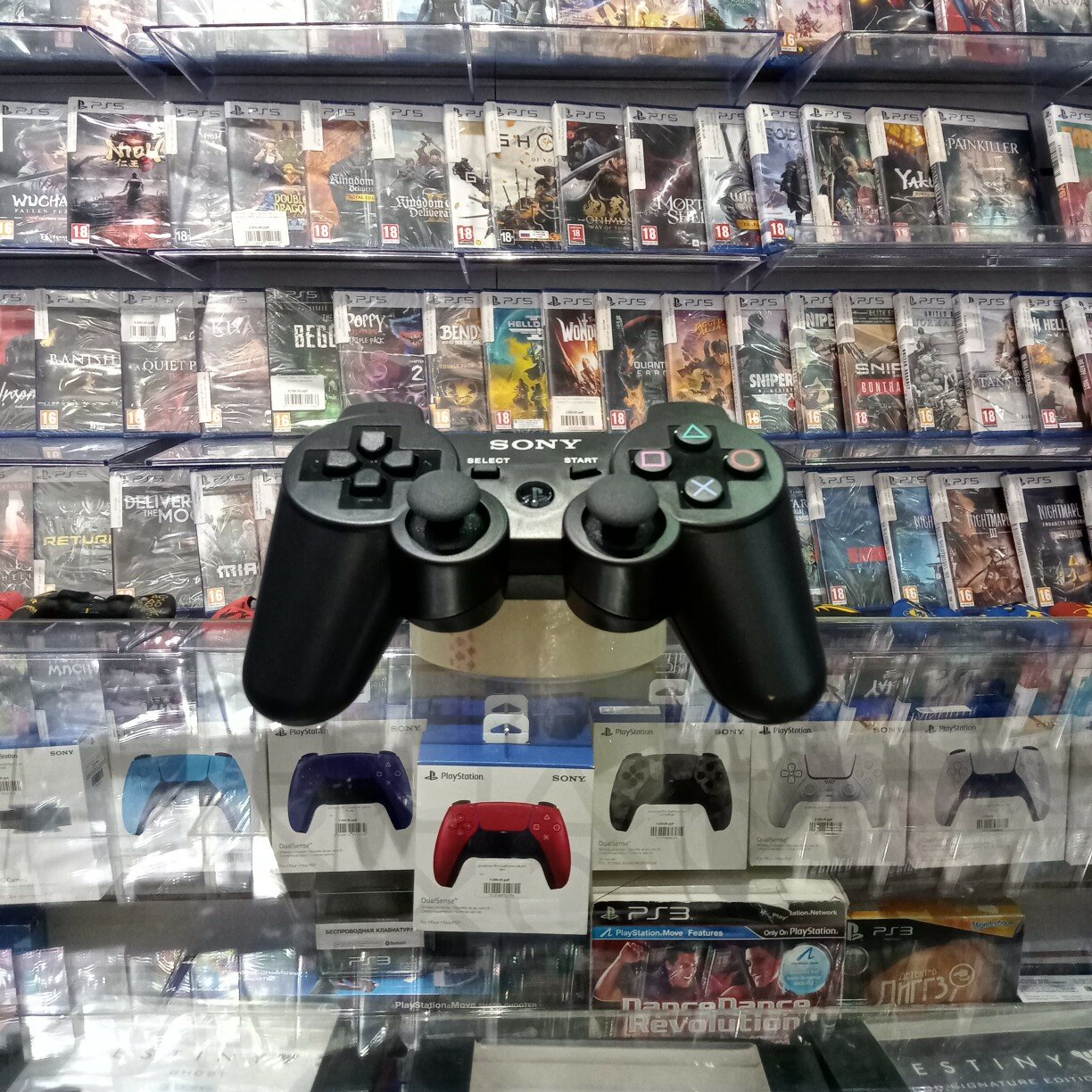 Джойстик PS3 DualShock чёрный (пакет)(SPC)