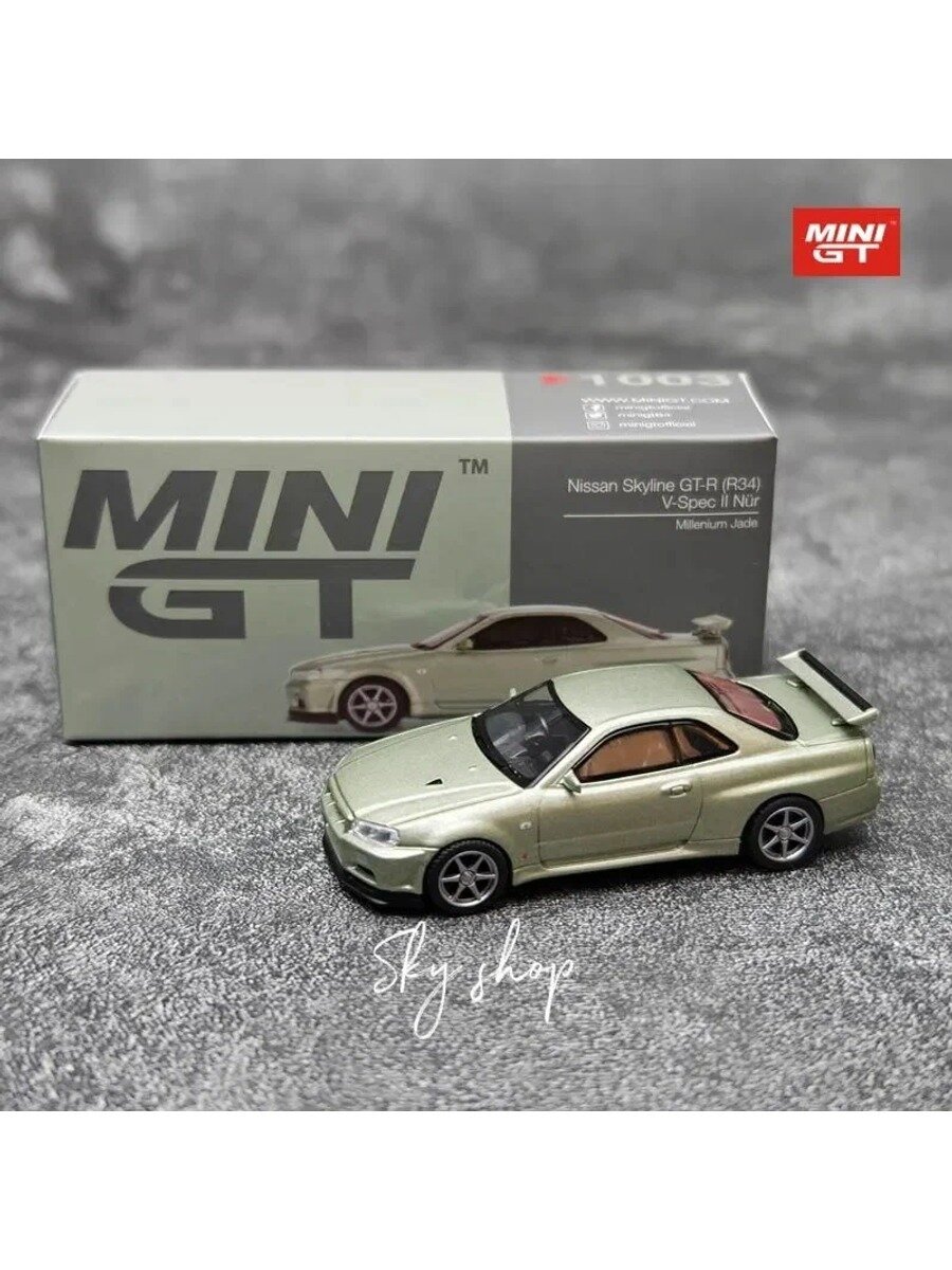 Машинка MINI GT 1:64 #1003 Nissan Skyline GT-R (R34) V-Spec II Nr Millenium Jade