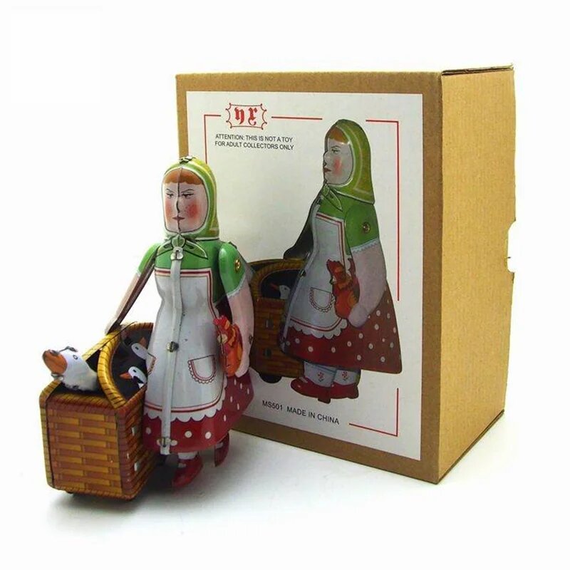 Механическая оловянная игрушка крестьянская женщина