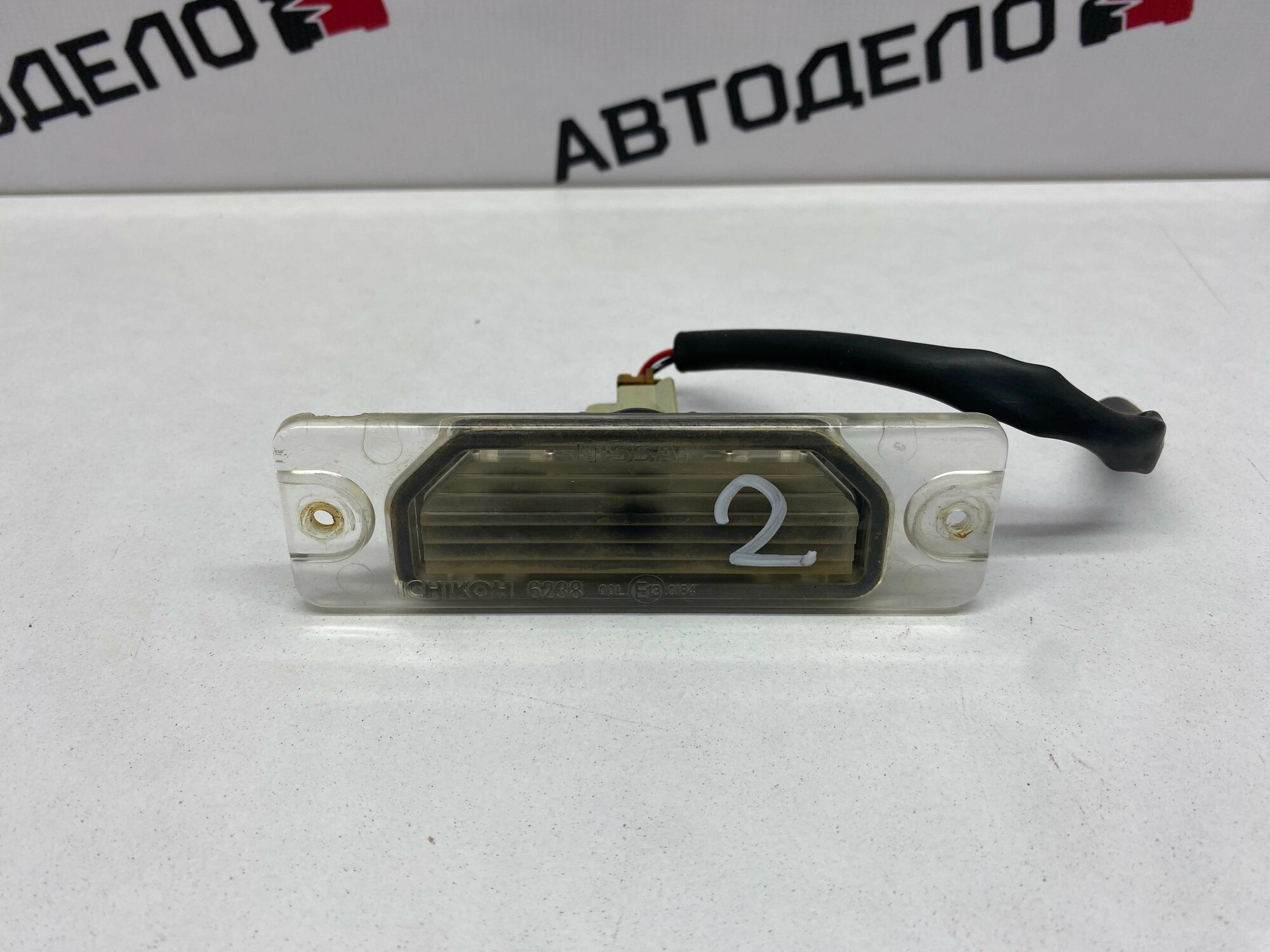 Фонарь подсветки номера Nissan Almera N16 2001 г