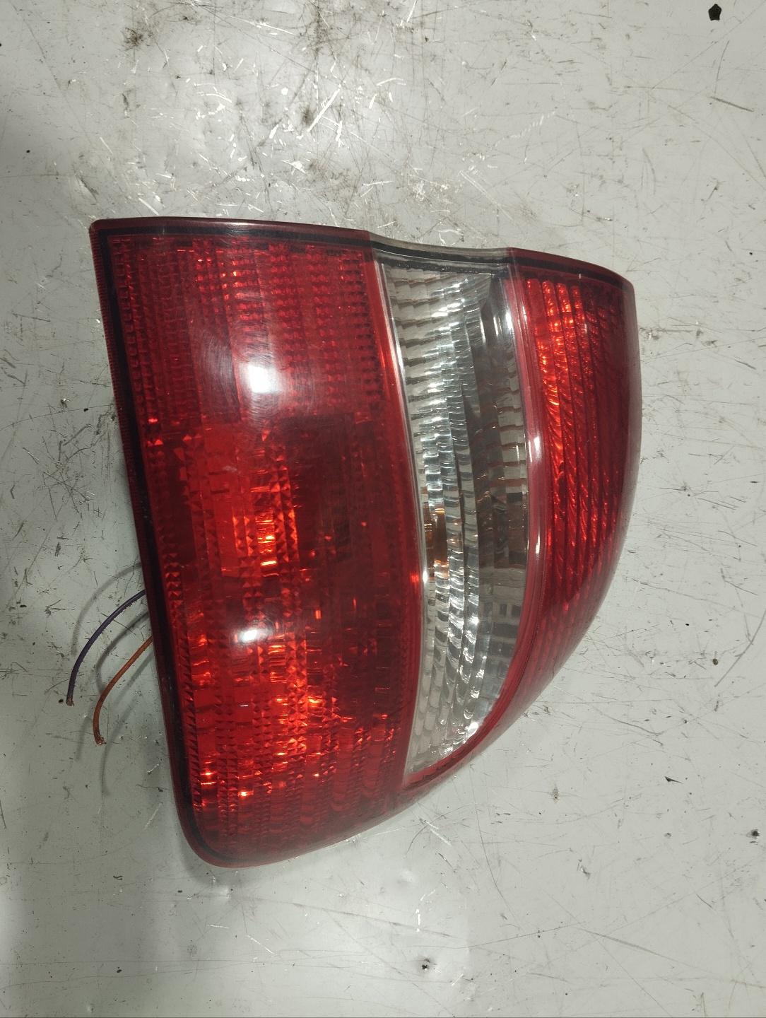 Фонарь задний левый Volvo V40 1 2-й рест. (2002 - 2004) 30621888
