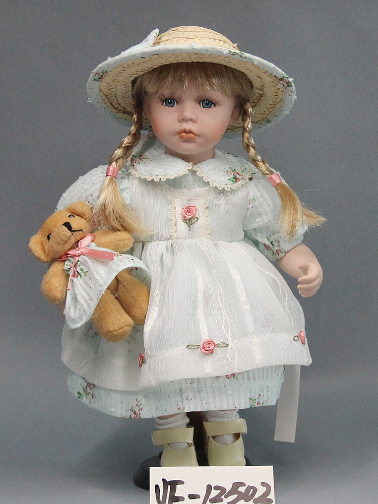 Кукла Polly Dolls "Полли", фарфоровая, на подставке, высота 35 см, разноцветная