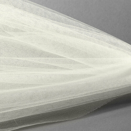 Фатин Кристалл средней жесткости блестящий арт. K. TRM шир.300см, 100% полиэстер цв. 03 К уп.5м - св. молочный