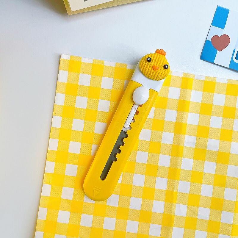 Нож канцелярский с зажимом "Цыпленок", 9 мм, цвет желтый