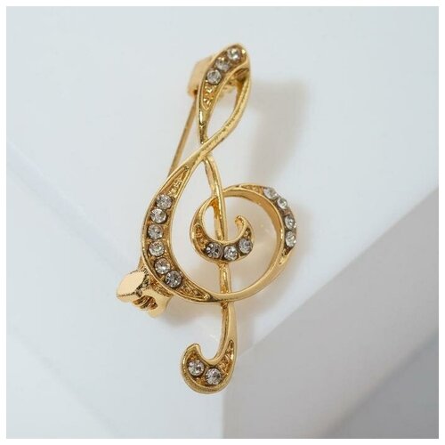 фото Брошь "скрипичный ключ" сияние, цвет белый в золоте нет бренда