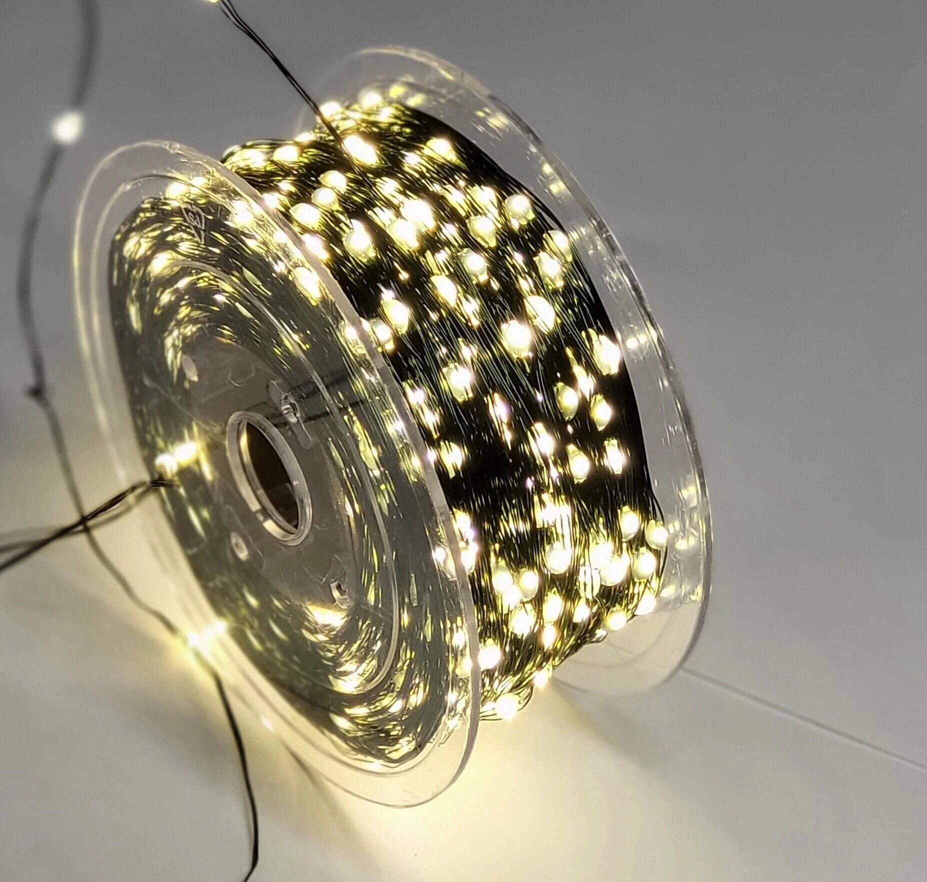 Светодиодная LED гирлянда «Роса»: цвет тёплый белый/100 м/1000 LED ламп/интерьерная/темно зелёный провод/пульт управления/8 режимов работы/с таймером.