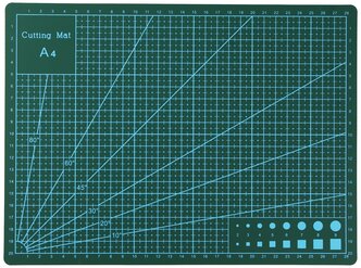 Коврик для макетирования и резки А4 двусторонний с самовостанавливающимся покрытием 297 x 210 х 3мм. Цвет сине-зеленый с разметкой и геометричиескими рисунками.