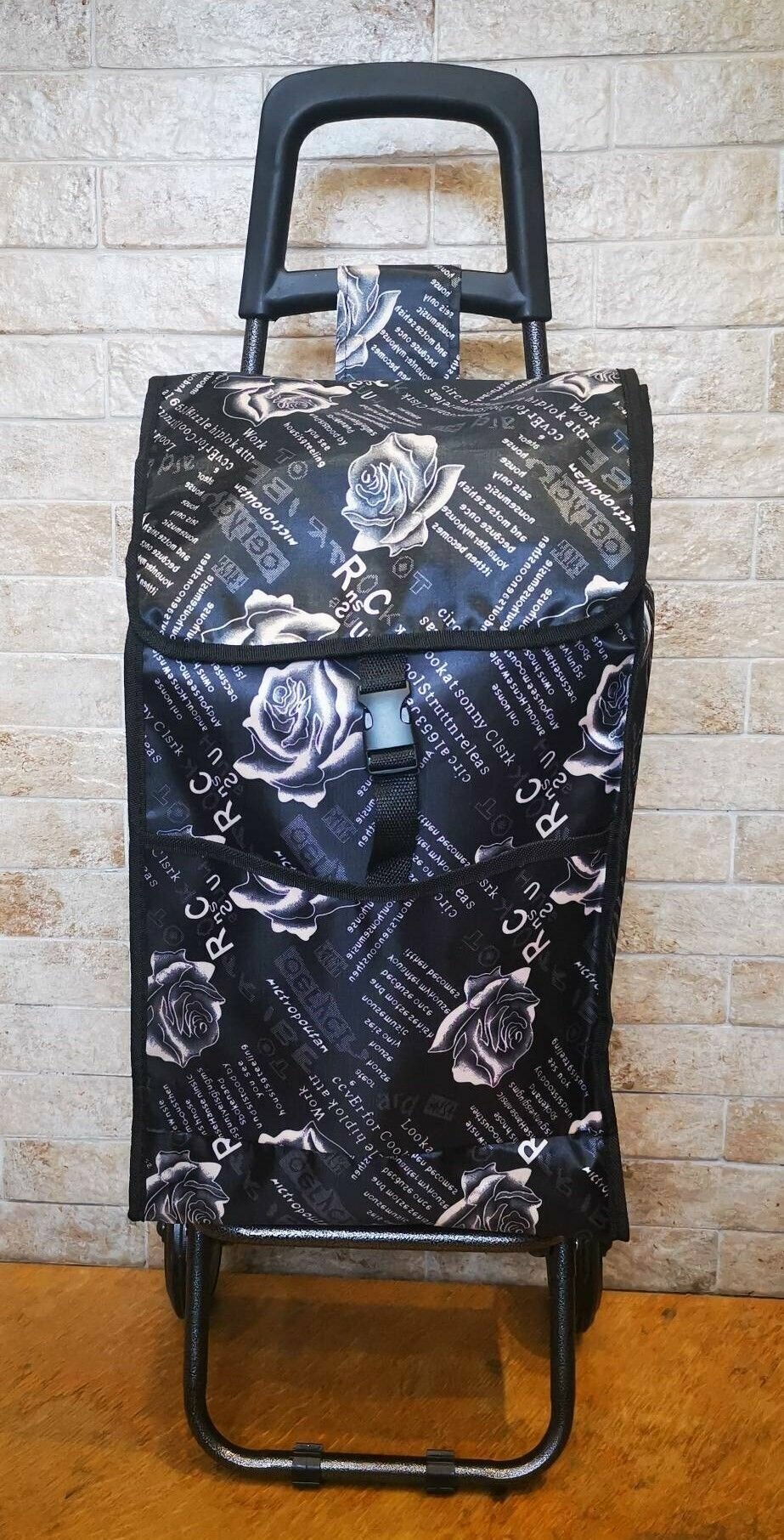 фото Сумка-тележка; складная; металлические колеса; высокая ручка.