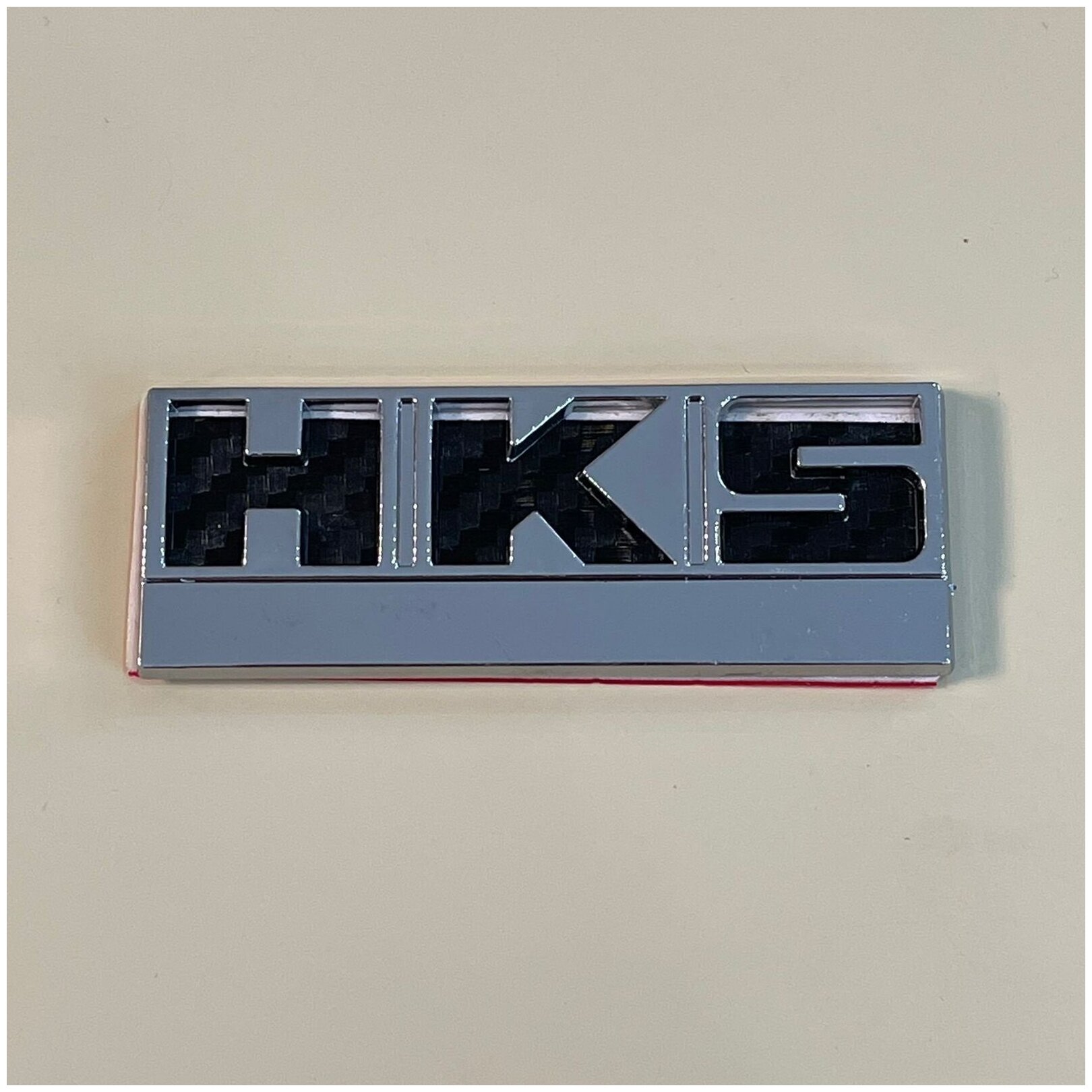 Шильдик надпись HKS 68х21мм