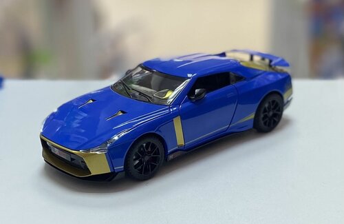 Машинка металлическая инерционная 1:24 Nissan GTR