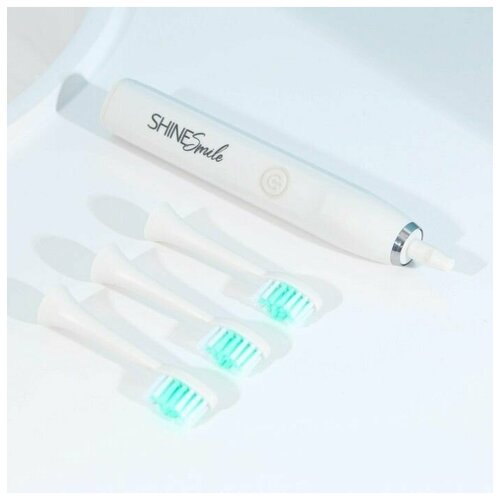 Электрическая зубная щётка 