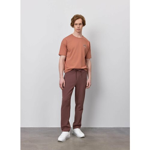 фото Брюки спортивные just clothes коричневый. декор термологотип. пояс резинка, шнурок. карманы спереди 2 молн, сзади нет. д 102см., размер xxxl, коричневый