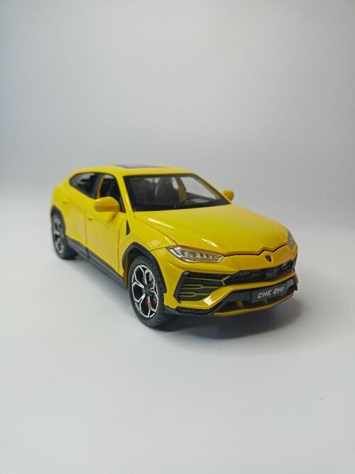 Коллекционная машинка игрушка металлическая Lamborghini Urus для мальчиков масштабная модель 1:24 желтая