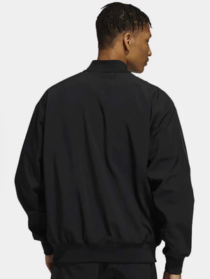 Adidas pharrell hotsell track top