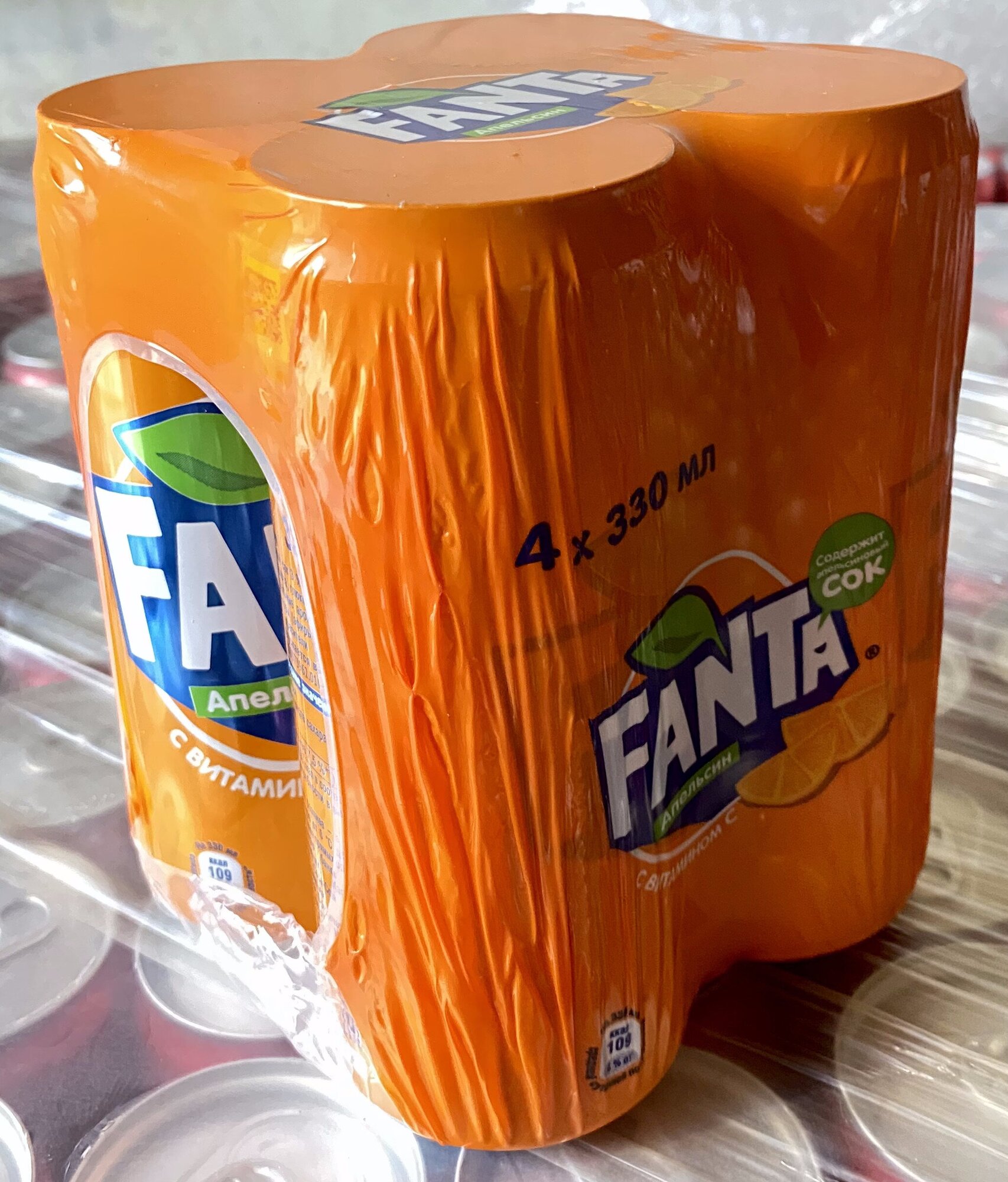 Газированный напиток Fanta апельсин 0.33 л ж/б упаковка 4 штуки оригинал (Беларусь) - фотография № 4