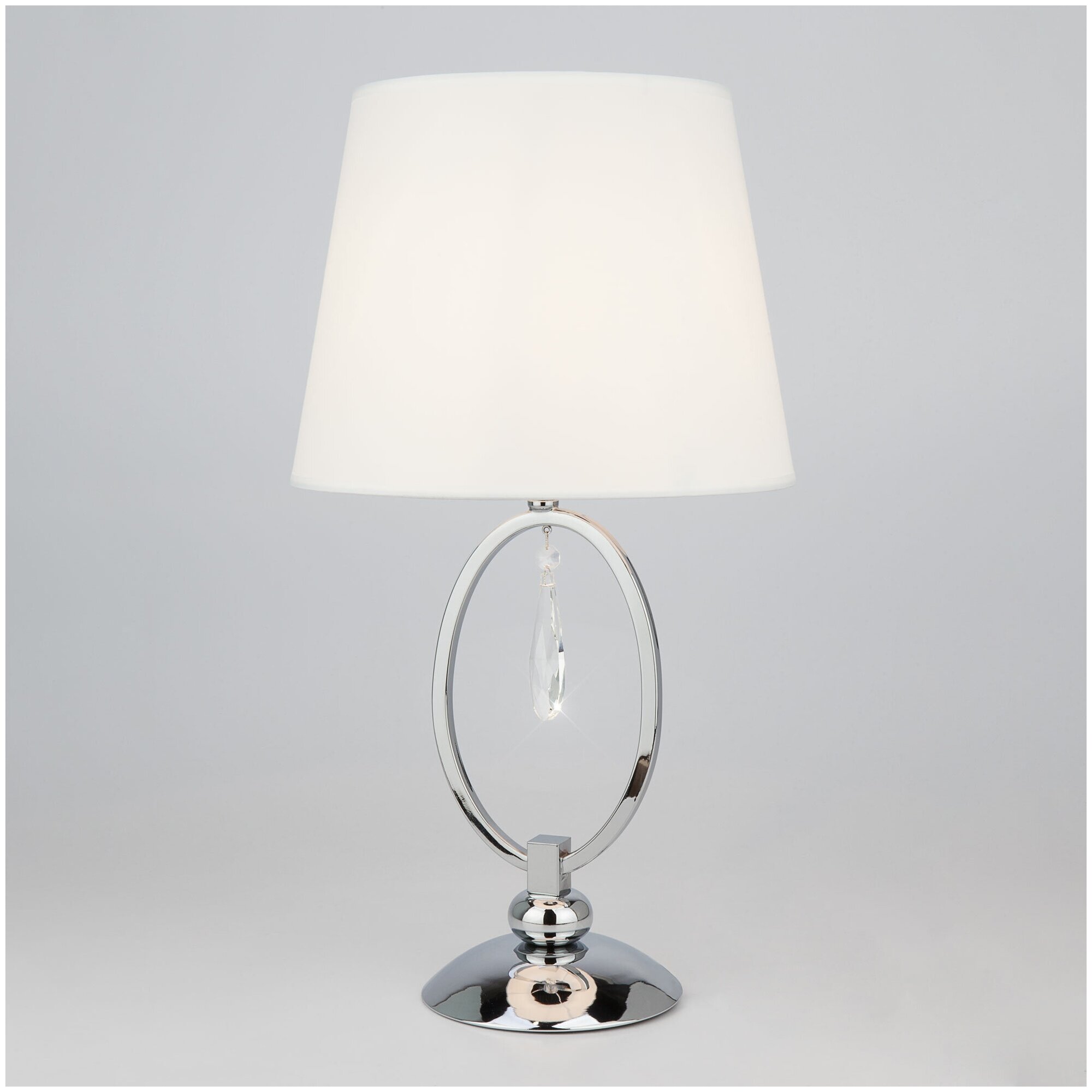 Настольная лампа с белым абажуром Eurosvet Madera 01055/1, цвет хром/прозрачный хрусталь Strotskis