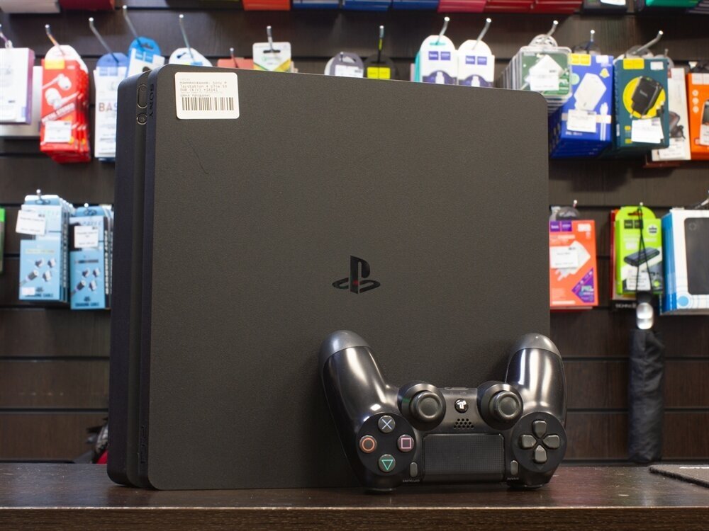 Игровая приставка Sony PlayStation 4 Slim 500 ГБ HDD, без игр, без дополнительных аксессуаров, черный