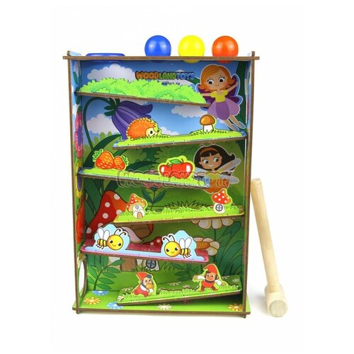 фото Развивающая игрушка woodlandtoys стучалка горки полянка 29*20,5 россия