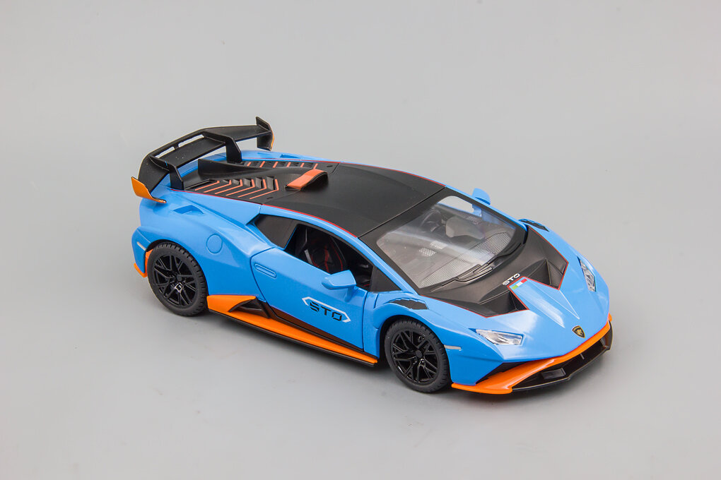 Металлическая инерционная машинка "Lamborghini Huracan STO" масштаб 1:24, длина 21 см голубая