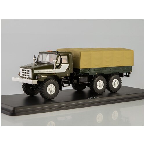 Миасский грузовик 43223 бортовой с тентом