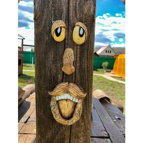 Лицо гномов на дерево