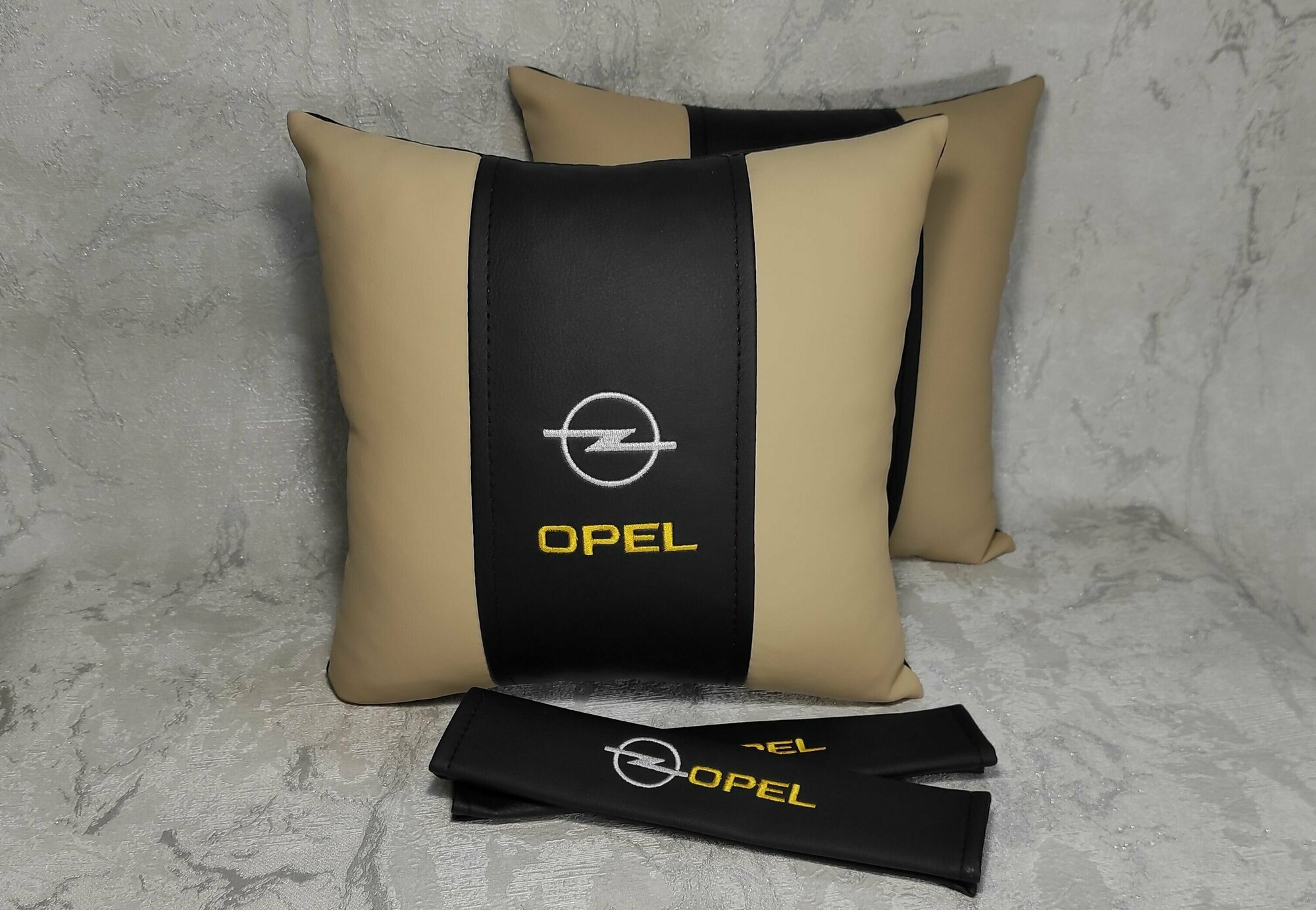 Подарочный набор: декоративная подушка в салон автомобиля из экокожи и накладки на ремень безопасности с логотипом OPEL, комплект 3 предмета