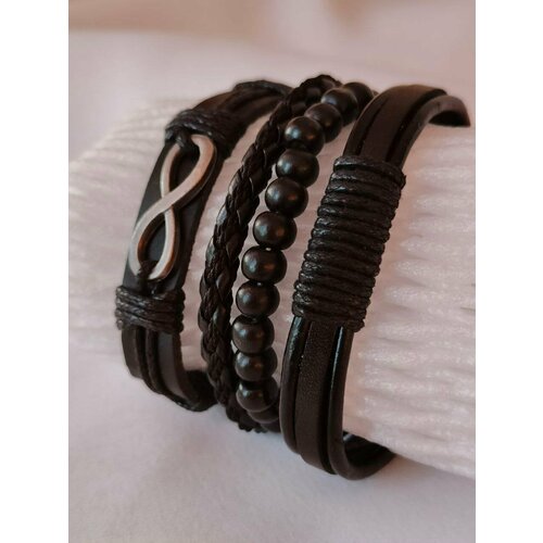 фото Славянский оберег, плетеный браслет браслет на завязках безразмерный, кожаный, бохо, бижутерия, украшение на руку, комплект\набор 4 в 1, дерево, металл, 4 шт., размер 30 см, размер one size, диаметр 8 см, черный, коричневый reniva