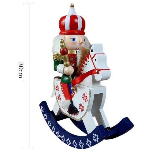 Щелкунчик на лошадке-качалке в зеленом камзоле