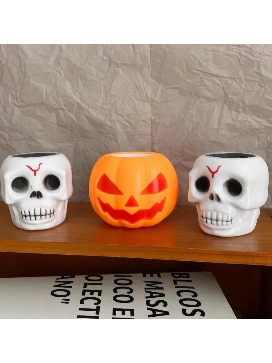 Игрушки антистресс череп и тыква — фото 1