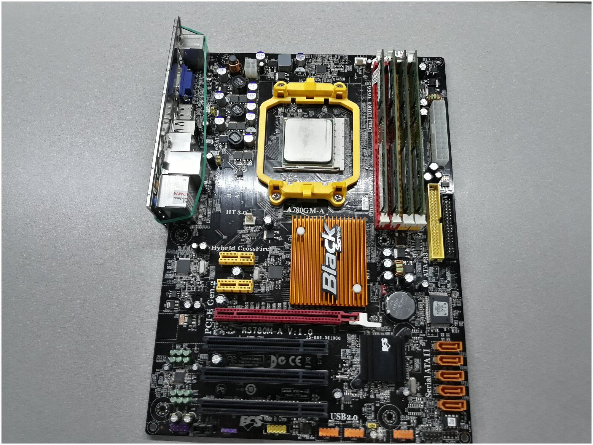 Комплект AM2+ (ECS A780GM-A + AMD Phenom X4 9550 4 ядра по 2,2Ghz + 8Gb DDR2 800Mhz (4x2Gb))